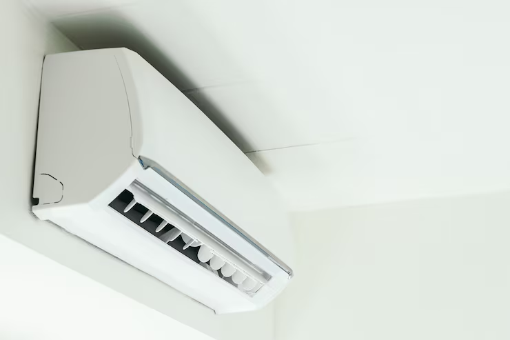 Air conditioning technician inspecting an AC unit before a resale or buyback deal